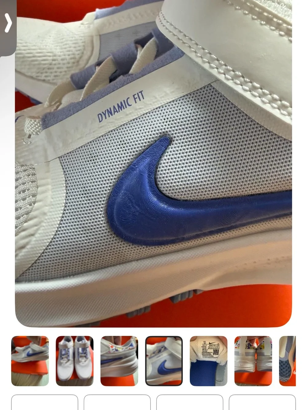 Nike White Kids Sneakers with Blue Swoosh and Multicolor Collar